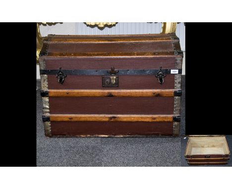 Early 20th Century Travelling Steam Trunk Of Typical form, brass and metal bound, missing interior tray