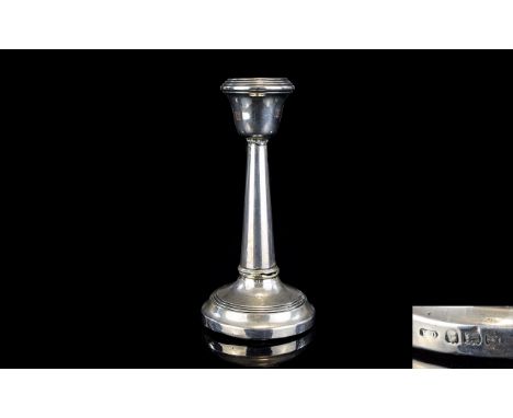 A Silver Single Candlestick. Hallmarked for Birmingham C.1921. 5.1/4 Inches Tall. 