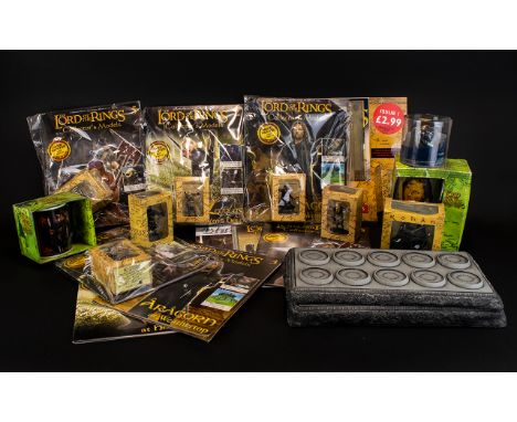A Collection Of Lord Of The Rings Items Including Lets hunt some orc stein glass, The lord of the rings - the return of the k