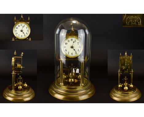 Antique Period Anniversary - 400 Day Brass Clock and Glass Dome. Features White Porcelain Dial, of Solid Brass Construction. 