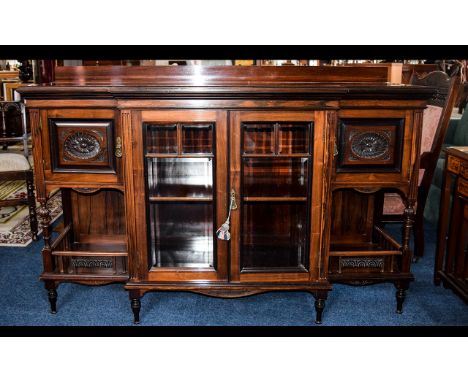 A Late 19th/Early 20th Century Brake Front Chiffonier Rosewood display cabinet with glazed centre display between two cupboar