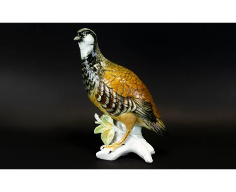 A Czech Ceramic Figure In The Form Of A Grouse Detailed figure on stylised branches, glazed finish, 11 inches in height, very