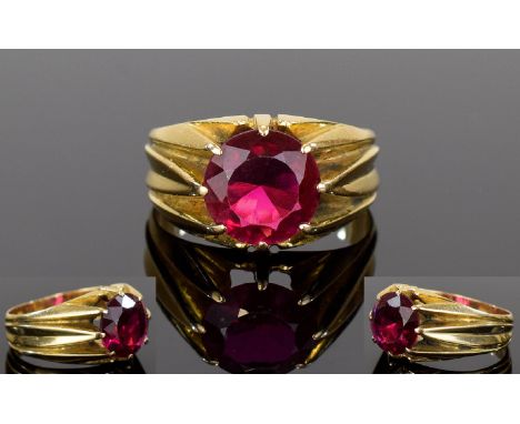 18ct Gold Set Single Stone Ruby Ring. In a Gypsy Setting. The Ruby of Excellent Pigeon Blood Colour. Est Weight 3.25 cts. Not