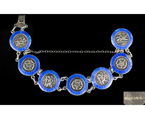 Superb Quality- 1940's Silver And Blue Enamel Set Bracelet. The roundel's showing embossed images of Roses and St Christopher