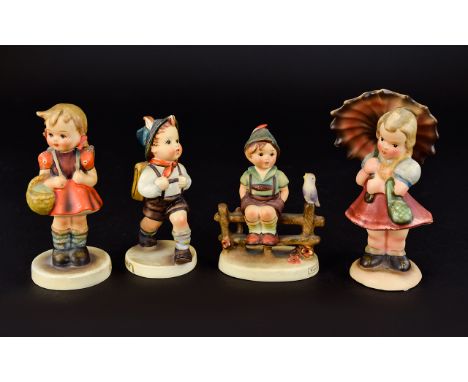 Three Hummel Figures Each in good condition, each marked to base with blue factory mark and 'W Germany' stamp. The first 'Sch