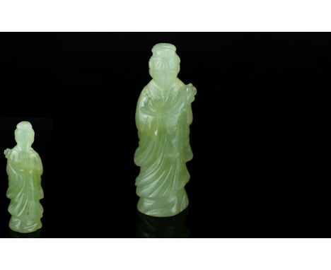 Jade Chinese Figure of a Goddess holding a palm frond.