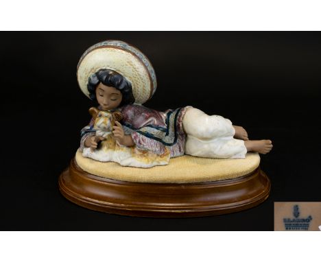 Lladro Gres Figure ' Julio ' Mexican Boy. Raised on Oval Shaped Wooden Plinth. Sculpture Jose Puche. Model no 2168. Issued 19