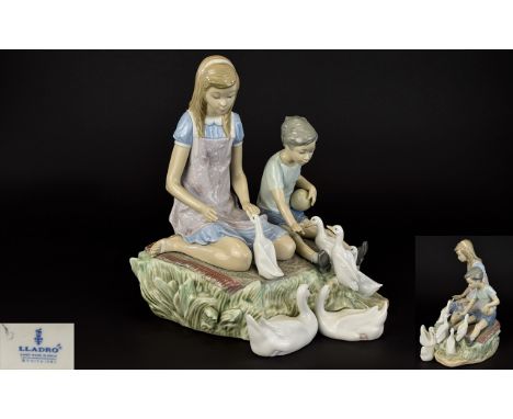 Lladro - Signed Porcelain Figure Group - Boy and Girl Playing ' Ducks at a Pond ' Model No 5303. Sculpture V. Martinez. Issue