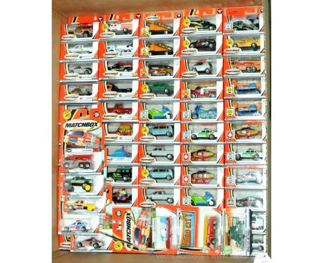 Matchbox Superfast a boxed group of Mattel Wheels issues including Car Carrier, Policia Police Car, also Polizei, Land Rover 