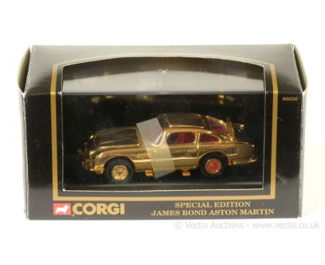 Corgi 96656 "James Bond" Aston Martin DB5 (1/43rd scale) - gold plated finish, red interior and tyre slashers - Mint in a Nea