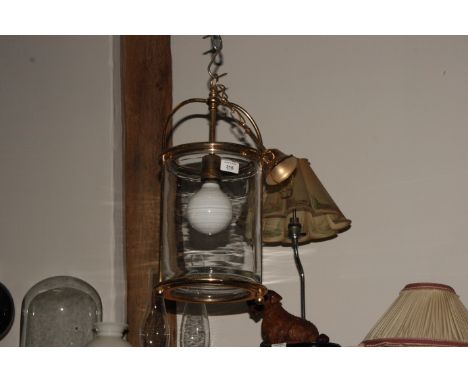 A brass ceiling lantern with cylindrical shade, 18" high