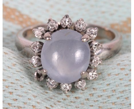 An 18ct white gold, diamond and grey Sri Lankan Sapphire cluster ring (one diamond missing), size M