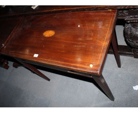 A George III Cuban mahogany and line inlaid fold-over top tea table, on square taper supports with double gate action, 36" wi