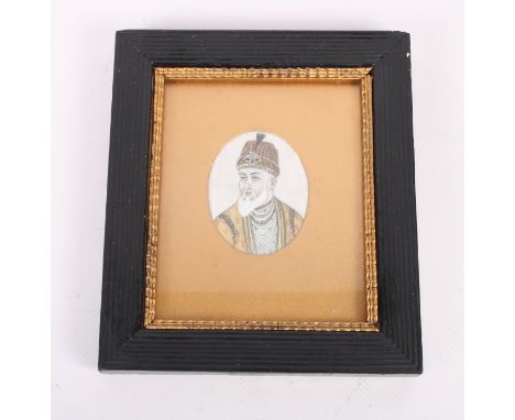 An Indian portrait miniature on ivory of Babur Shah II, 2 1/2" x 1 3/4", in oval gilt mount and reeded frame