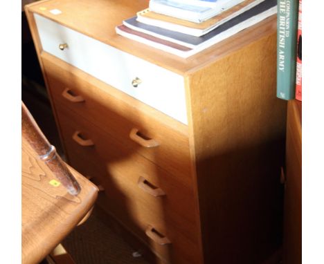 A 1960s G-Plan light oak chest of four long drawers, 30" wide