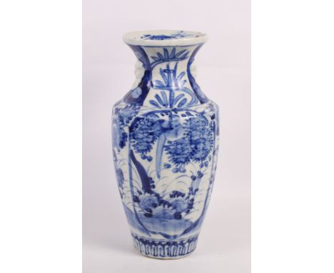 A Chinese porcelain blue and white scroll decorated vase with flared rim, 15" high, a modern Chinese crackle ware vase with b