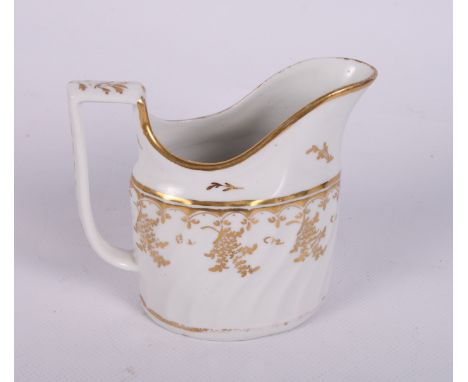 A late 18th Century Worcester porcelain gilt decorated part tea service including teapot, tea bowls, saucers, etc