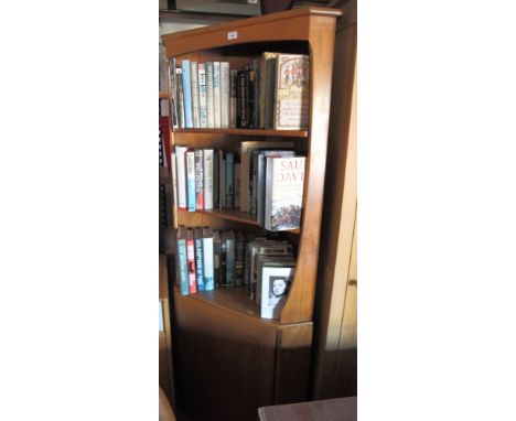 An Ercol light elm corner unit with open shelves over cupboards, 30" wide