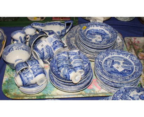 A collection of Spode Italian dinner plates, tea plates, cups, saucers, egg cups and a sauce boat