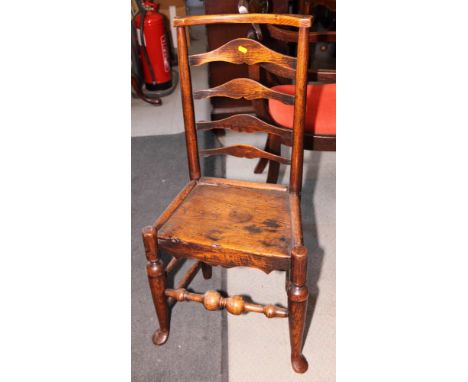 An early 19th Century ash and elm panel seat chair with ladder back, on turned and stretchered supports with pad feet