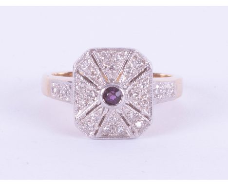 A 9ct ring of stylish design, set with amethyst, size M.