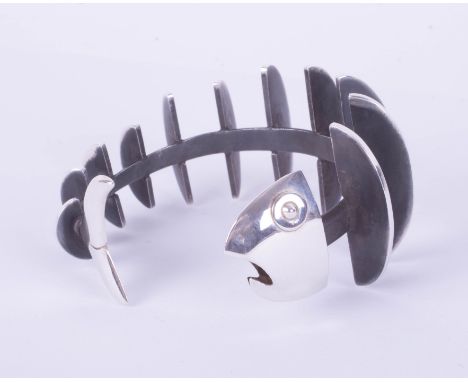 An unusual contemporary silver fish bangle.
