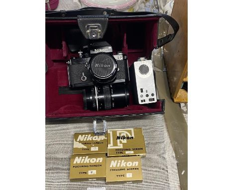 A Nikon F2 7350979 camera body with lens etc 