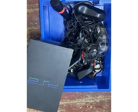 A PS2 console and accessories 
