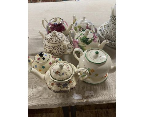 A job lot of assorted vintage teapots with various makers including spode. Collection only 