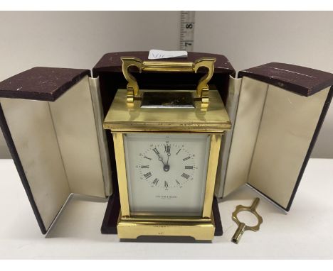 A Taylor and Bligh Carriage Clock boxed with key 