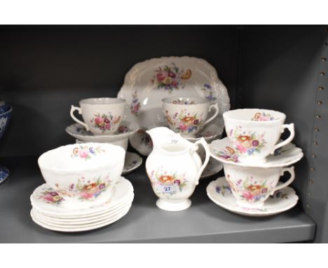 A selection of Coalport 'Old Coalpot' ceramics, having floral pattern, to include cups, saucers, sugar and creamer.