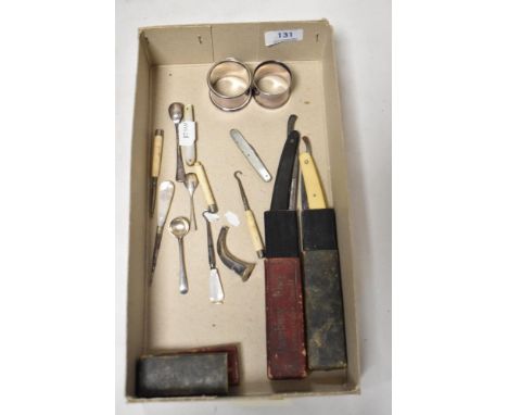 Two vintage cut throat razors, three button hooks, one MOP handled, and similar.