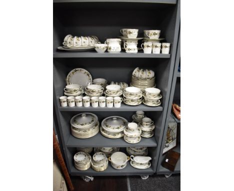 A large collection of Royal Doulton 'Larchmont' dinner service, cups and saucers, tureens, soup bowls, serving dishes and muc