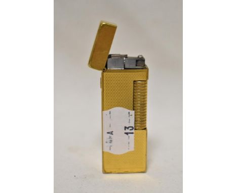 A mid century Dunhill brass lighter, having GHC engraved to cap.