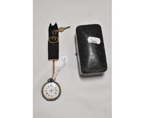 A small Victorian pocket watch having a HM silver chase worked case with an enamel dial