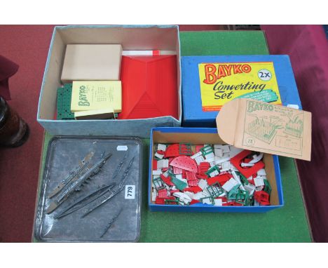 Nine Mid XX Century Lead Model Waterline Ships and a Quantity of Bayko Building Set Components.