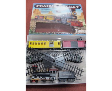 A Timpo Ref No. 243 "The Prairie Rocket" Train Set, battery operated, comprising "Old Timer Locomotive and Tender", two items