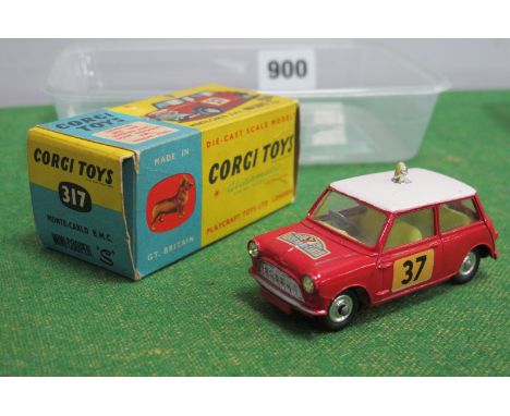 A Boxed Corgi Toys #317 Diecast Model Monte-Carlo B.M.C Mini Cooper 'S', red body, white roof, yellow interior, Car No 37 (Pa