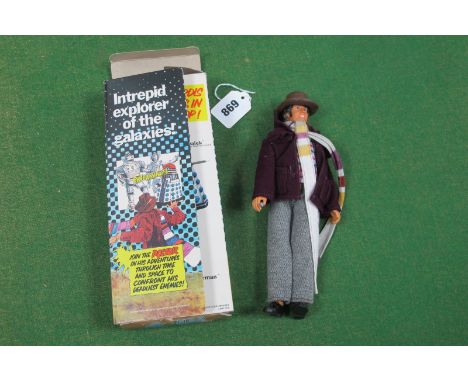 A Boxed Circa 1970's Doctor Who 'Tom Baker' Plastic Action Figure, by Denys Fisher, accessories include hat, scarf and sonic 