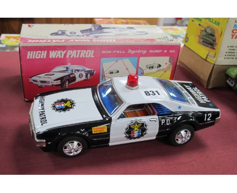 A Boxed Circa 1970's Battery Operated Tinplate #C-33 Toronado Highway Patrol Car, by Taiyo (Japan), original instruction shee