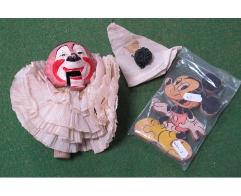 A Folk Art Ventriloquists Hand Puppet, in the style of a clown typical painted face, opening mouth mechanism, 15cm high; toge