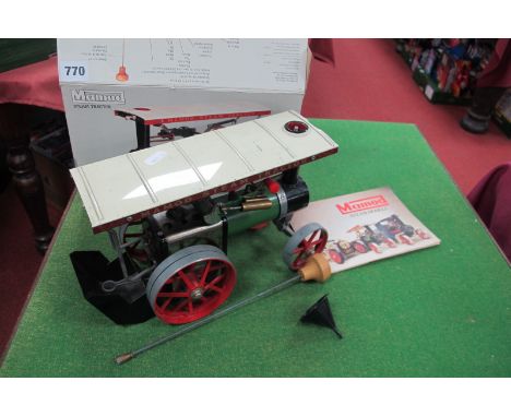 A Mamod 'Live Steam' TE1a Steam Tractor, with burner, scuttle, steering rod, funnel literature, signs of wear, boxed.