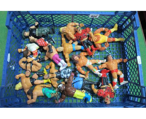 Sixteen Original Circa 1990's Plastic Action Figure WWF Wrestlers by Hasbro, to include Boss Man, Bush Whackers, Hulk Hogan, 