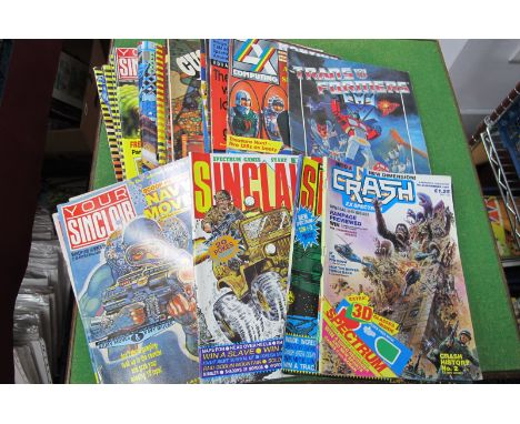 A Completed (Circa 1986) Panini Transformers Sticker Book, together with a quantity of 1980's computing magazines to include 