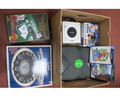 An Original Microsoft XBox Gaming Console, a Nintendo Game Cube Console with Super Mario Sunshine and Tiger Woods PGA Tour 20