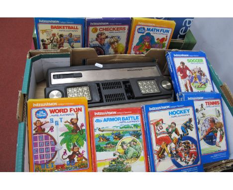 A Mattel (1979) Intellivision Home Gaming Console, together with eight cartridge games:- Checkers Basketball, World Fun, Socc