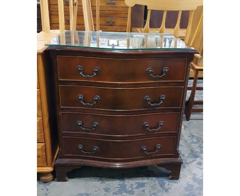 Reproduction mahogany serpentine fronted chest of four long drawers with fluted canted corners on bracket feet, 70cm