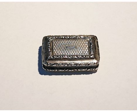 Early 19th century silver vinaigrette, indistinctly hallmarked, possibly by John Thropp, rectangular and engine-turned, 3.5cm
