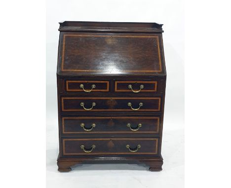 Edwardian Turner & Co mahogany bureau with satinwood banding, the fall front enclosing a cupboard, a pair of drawers and pige