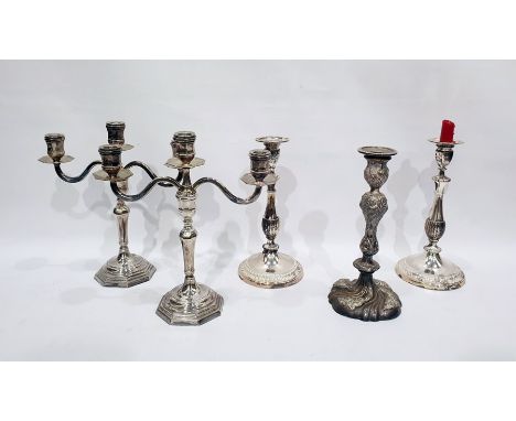Pair of three-branch electroplated candelabra, a pair of electroplated candlesticks and another candlestick (5) 